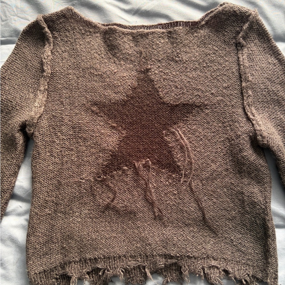 Urban Outfitters distressed star sweater